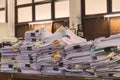 Pile of documents on desk stack up high Royalty Free Stock Photo