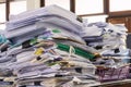 Pile of documents on desk Royalty Free Stock Photo