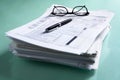 Pile of documents and tax form Royalty Free Stock Photo