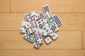 Pile of Dominoes on Wooden Floor