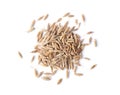 Pile of dried Caraway seeds on white background