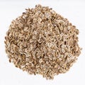 Pile of dried dill seeds close up on gray Royalty Free Stock Photo