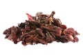 Pile of dried karkade flowers isolated on white background. Red aromatic hibiscus tea. Dry tea leaves hibiscus isolated
