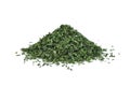 Pile of dried parsley leaf or petroselinum crispum isolated