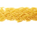 Pile of dried penne pasta isolated Royalty Free Stock Photo