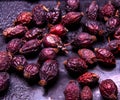 Pile of dried rose hips . Country house style. Authentically