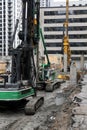 Pile drivers on construction site