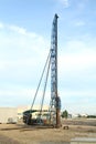 Pile driving crane on construction site