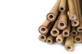 Pile of dry bamboo sticks on white background, closeup Royalty Free Stock Photo