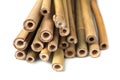 Pile of dry bamboo sticks on white background, closeup Royalty Free Stock Photo