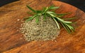 Pile of Dry Chopped Thyme on Wood Background Royalty Free Stock Photo