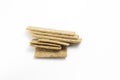A pile of dry wheat light slices of dry diet bread on a white background isolated Royalty Free Stock Photo