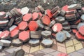 Pile of dyed red cubes for making outdoor pavement tiles Royalty Free Stock Photo