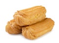 Pile of eclairs close-up on a white background. Isolated Royalty Free Stock Photo