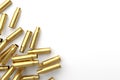 Pile of empty bullet on white background.