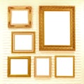 Empty golden picture frames on brick wall Royalty Free Stock Photo