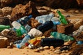 Pile of empty plastic bottles and other trash on beach. Generative AI Royalty Free Stock Photo