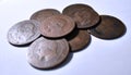 View of a pile of european coins from the eighteenth century with white background Royalty Free Stock Photo