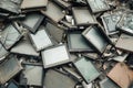 pile of ewaste with visible broken screens Royalty Free Stock Photo