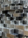 Pile of faceted steel blocks background