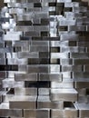 Pile of faceted steel blocks background