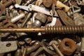 Pile of fasteners and screws close up. scrap metal. different metal details Royalty Free Stock Photo