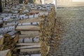 Pile firewood prepared for fireplace. Kiln dried wood for fire. Birch background Royalty Free Stock Photo