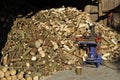 Pile of Firewood with Wood Splitter