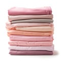 Pile of folded multicolored cotton t-shirts in a factory shop, different colors