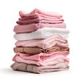 Pile of folded multicolored cotton t-shirts in a factory shop, different colors