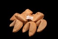 A pile of fortune cookies on black background Royalty Free Stock Photo