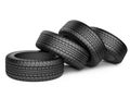 Pile of four new black wheel tyres for car