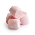 Pile of four pink mini marshmallows isolated on white