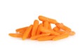 Pile of fresh baby carrots laying on a white background