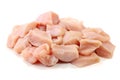 Pile of fresh diced and sliced raw chicken breast, cube form, isolated on white background Royalty Free Stock Photo
