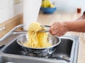 Pile of fresh pasta in strainer