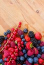 Pile of fresh red and blue berries on table Royalty Free Stock Photo