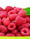 Pile of fresh, ripe raspberries isolated on white background.