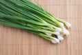 Pile of fresh spring onion on wood table Royalty Free Stock Photo