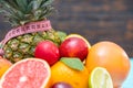 Pile of fresh tropical fruit with a tape measure Royalty Free Stock Photo