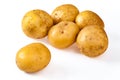 Pile of fresh, yellow, ripe potatoes, isolated on white. Close u Royalty Free Stock Photo