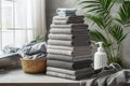 Pile of freshly laundered laundry, showcasing washed gray terry towels. Pristine cleanliness in folded household Royalty Free Stock Photo