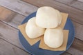 A pile of freshly made big white steamed buns on a plate Royalty Free Stock Photo