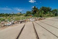 Pile of garbage on an old railway track near Havana airport, Cub