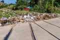 Pile of garbage on an old railway track near Havana airport, Cub
