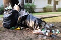 Pile of Garbage plastic black and trash bag waste many on the footpath, pollution trash, Plastic Waste and Bag Foam tray Garbage Royalty Free Stock Photo