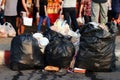 Pile of Garbage plastic black and trash bag waste many on the footpath, pollution trash, Plastic Waste and Bag Foam tray Garbage Royalty Free Stock Photo