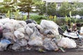 Pile of Garbage plastic many and trash bag waste many on the footpath, Pollution from plastic bag waste trash, Plastic Waste Royalty Free Stock Photo