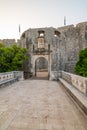 Pile gate entrance at Dubrovnik old town. Morning time during sunrise. Soft light. Dubrovnik is famous tourist destination in Royalty Free Stock Photo