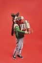 Pile of gifts held by girl Royalty Free Stock Photo